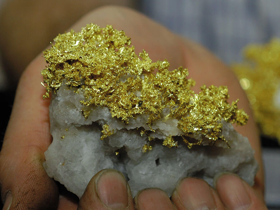 An old stone covered with gold